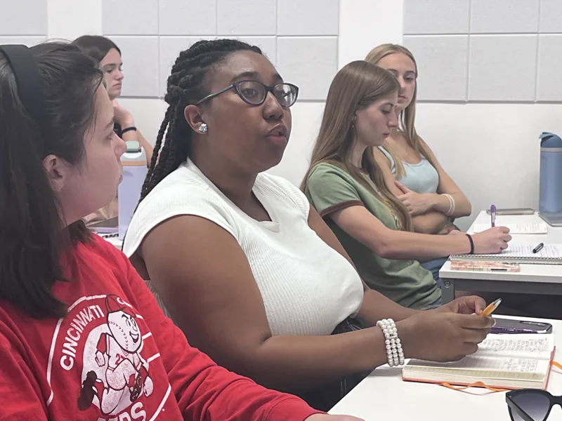 Students participating in a faculty-led journalism workshop