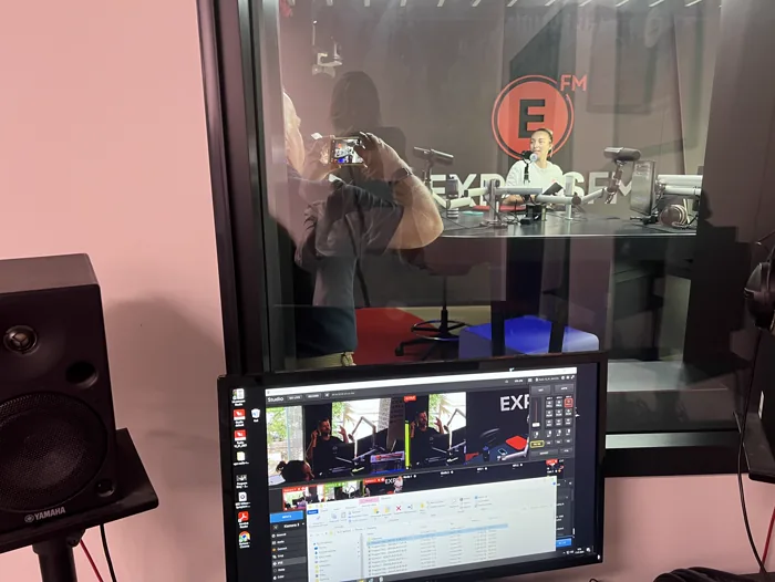 Students visiting an international newsroom studio